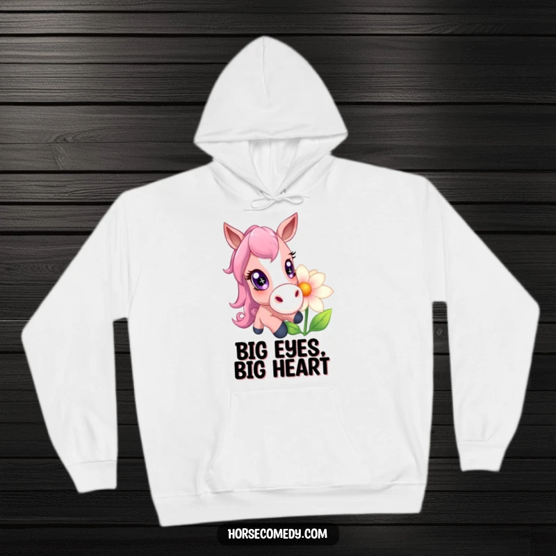Funny horse character with large, sparkling eyes gently nudging an oversized flower, featured on a cozy hoodie.