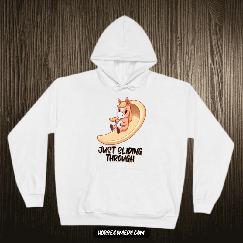 Funny horse hoodie featuring a giddy horse character having a blast sliding down a whimsical, winding slide, full of glee.