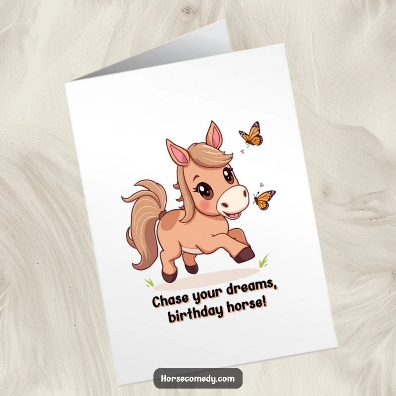 Funny free printable birthday card: a horse excitedly chasing a butterfly with wide, joyful eyes.