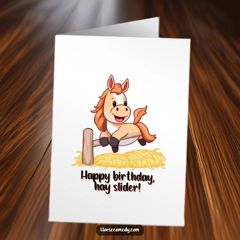 Funny Free Printable Birthday Card: A playful horse with a huge grin slides down a banister constructed entirely of hay, pure joy.