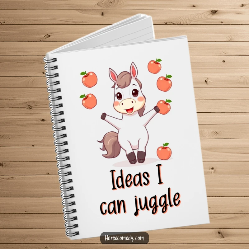 Funny horse character juggling apples on a notebook cover, encouraging creative and humorous writing.
