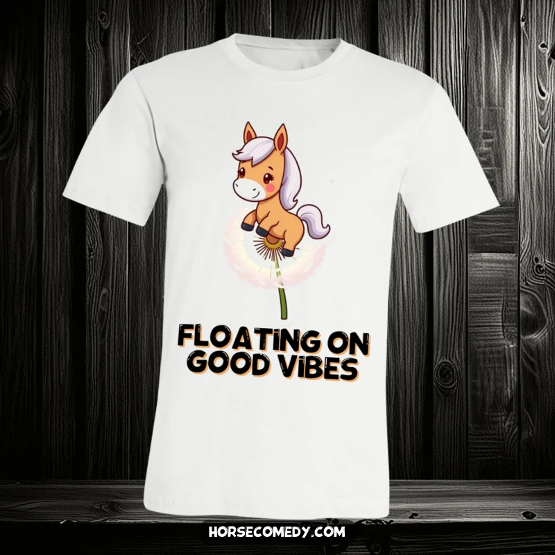 Funny Horse T-Shirt: A smiling horse character gracefully rides atop a giant dandelion seed, embodying pure, carefree adventure.